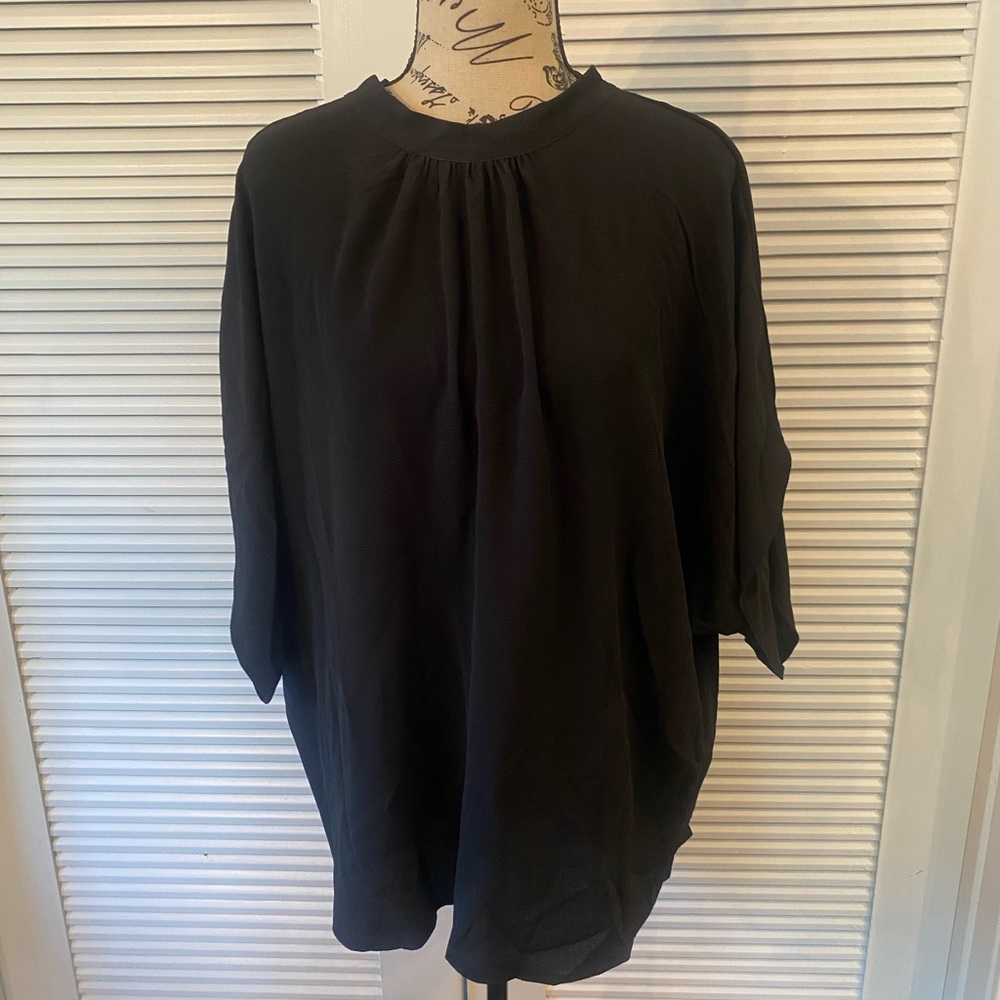 Flowy high neck black top with tie at the back of neck